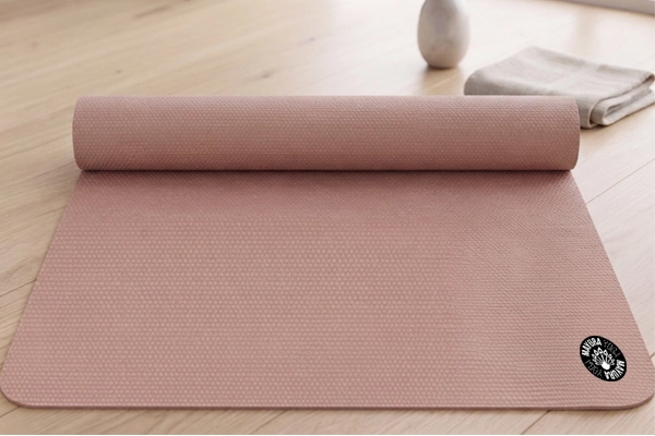 Mayura Eco yoga mat in use during a stretch